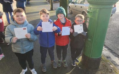 Senior Infants posting their Christmas Cards