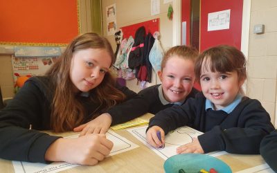 Junior Infants meet their 6th Class Buddies