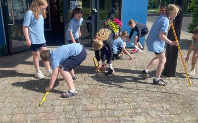 3rd class getting active by measuring various lengths for Maths!